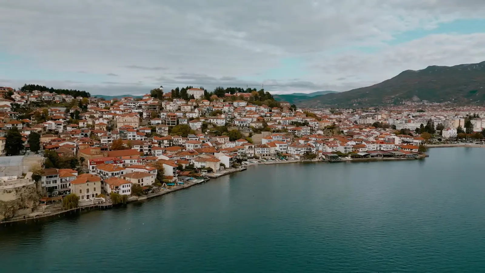Aerial view of a Greek coastal town on the water
